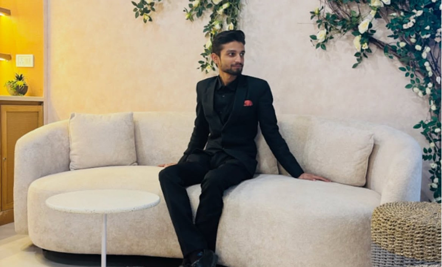 Sitting on a couch, dressed up